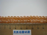 クラック水晶アクアオーラオレンジ（丸玉：6mm）